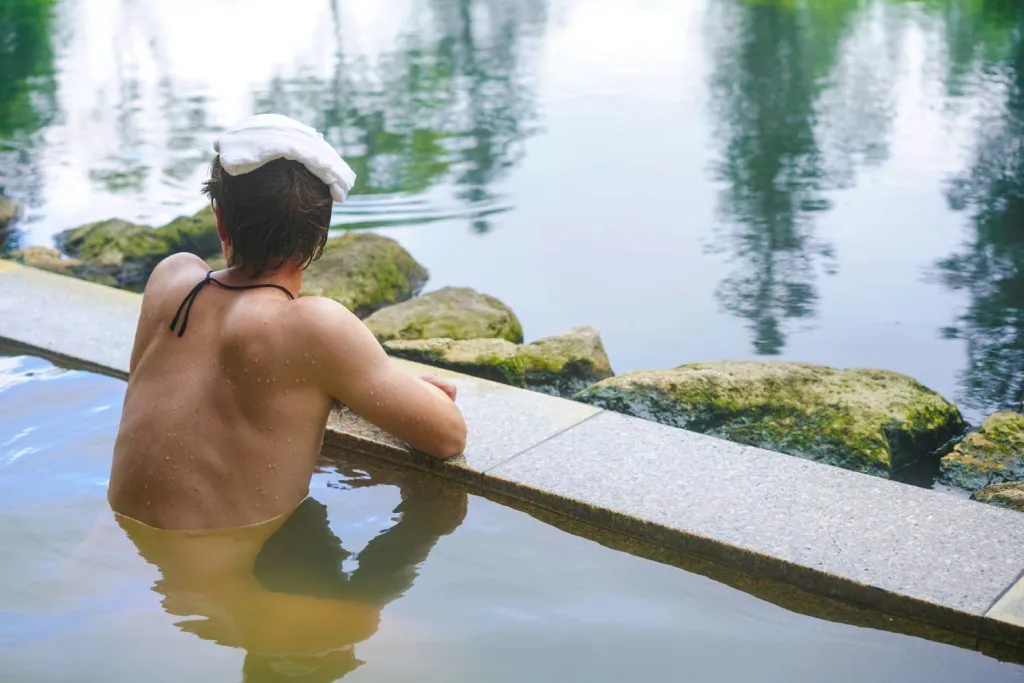 Man at hot spring onsen in Hokkaido Japan